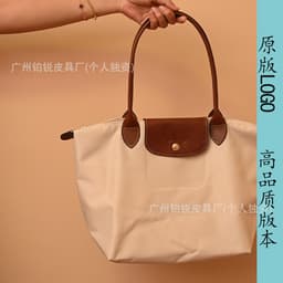 Folding nylon capacious waterproof bag, one-shoulder bag, genuine leather, with embroidery 2